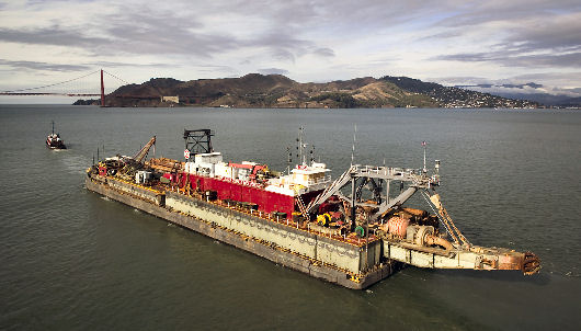 Barge with dredge Florida departing 