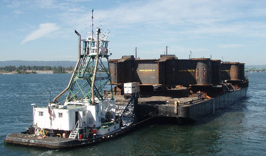 Lucky Logger loaed with the E2 footings departing from Vancouver