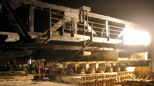 Rolling 4-th street bridge onto barge