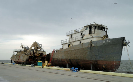 Sandy Point hull sections secured on barges