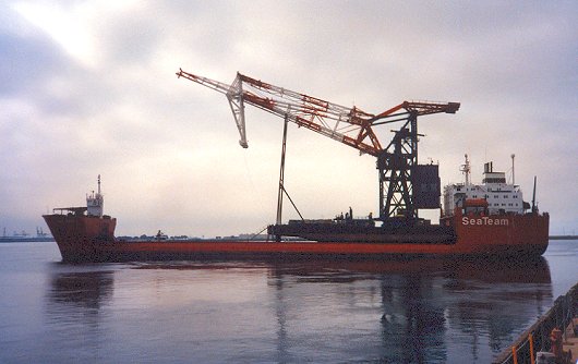 Sea Swan departing with Titan crane on deck