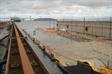 Submersing barge in dry dock