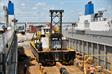 Dredge approaching cribbing blocks