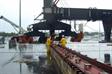 Skidding first crane onto dock